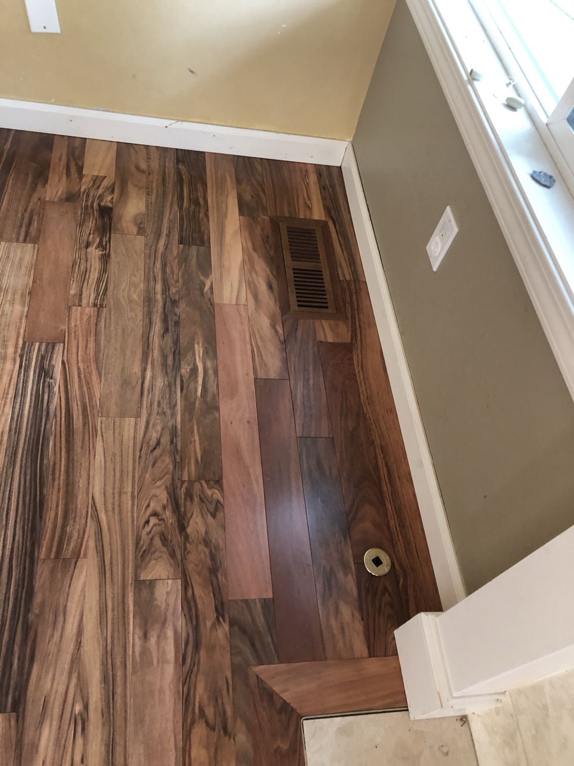 Hardwood flooring installation with floor register