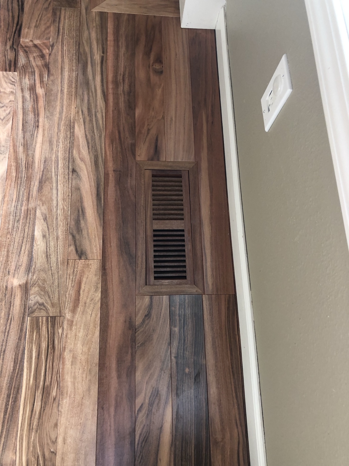 Hardwood flooring detail around floor vent