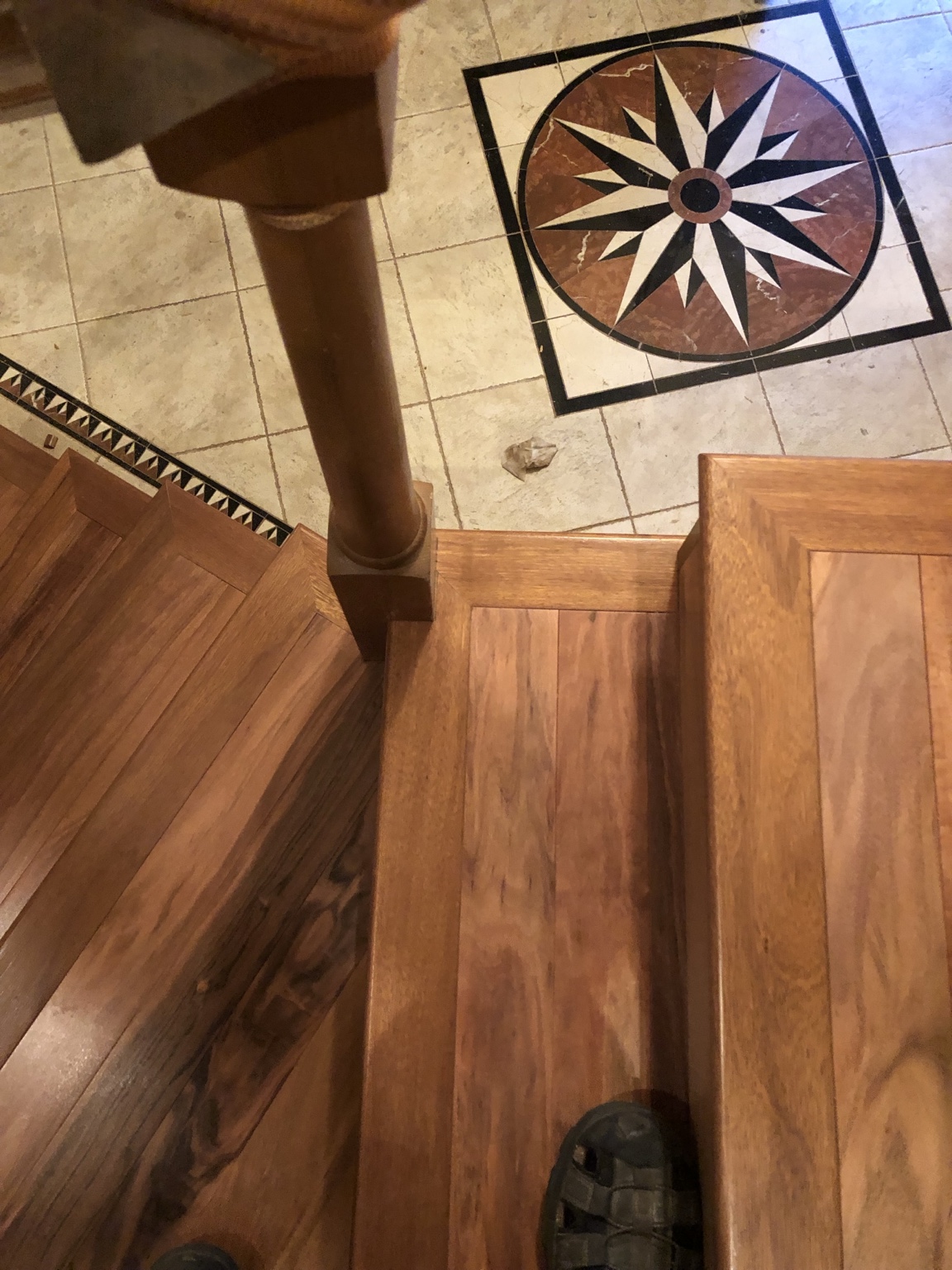 Custom flooring around stair post